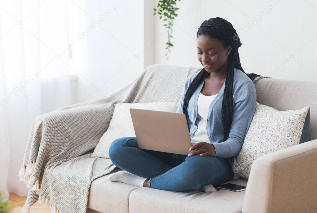 African American Girl Using Laptop, Searching Job Online In Internet