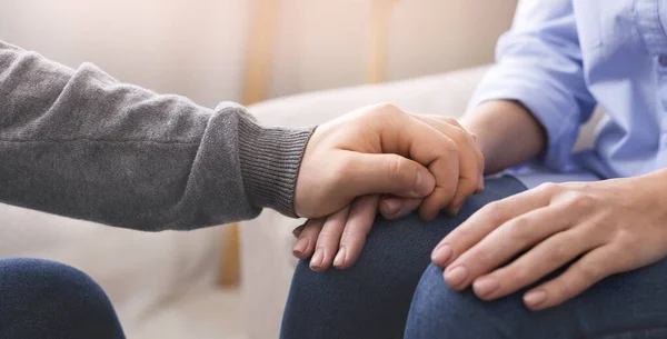 Psychologist consoling his female patient at personal therapy — Stock Photo, Image