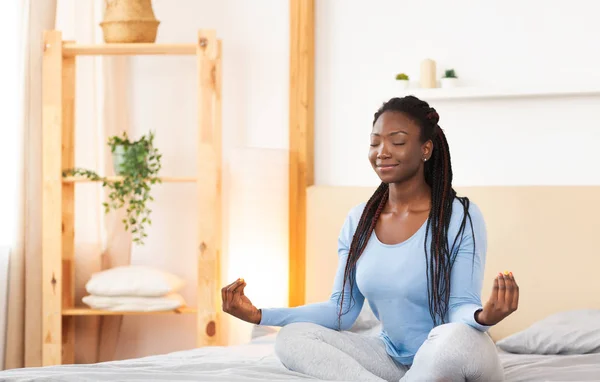 Peaceful Afro Lady Sitting Meditating In Bed At Home — Stock Photo, Image