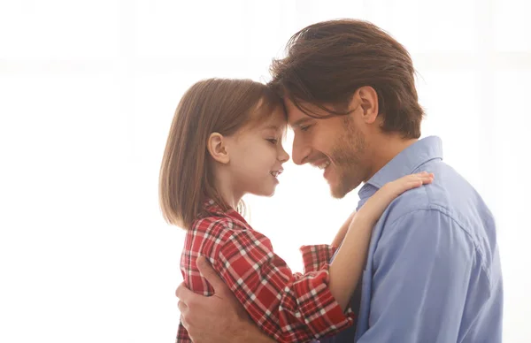 Close up portrait of father and daughter head to head — Stock Photo, Image