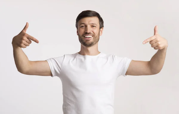 Positive Man Pointing Fingers At Himself Standing, Studio Shot — Stock Photo, Image