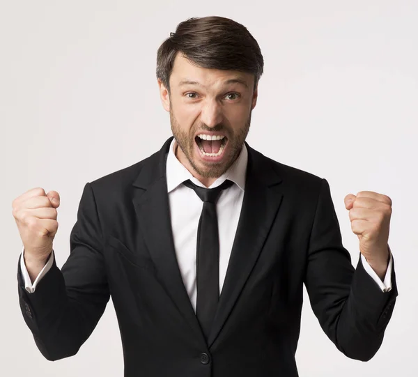 Emotional Businessman Screaming And Shaking Fists On White Background, Studio — Stok Foto