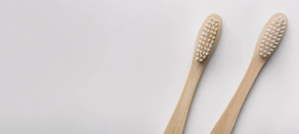 Two eco natural bamboo toothbrushes on white background — 스톡 사진
