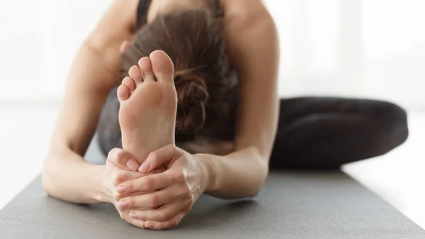 Flexible body concept. Girl stretching during yoga practice — 스톡 사진