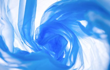 Beyaz arkaplan üzerinde plastik poşet folyo girdap deseni