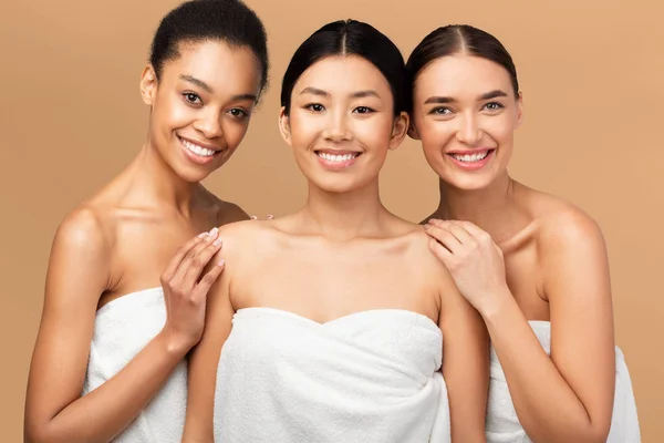 Three Diverse Women In Bath Towels Posing Over Beige Background — Stock Photo, Image