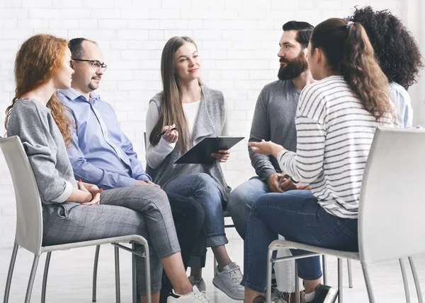 Patients listening to advices of female psychologist — 스톡 사진