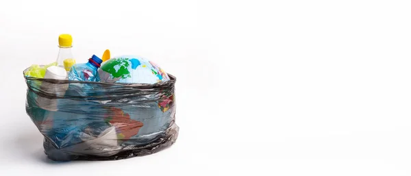 Earth world globe and plastic bottle waste on white background — Stock Photo, Image