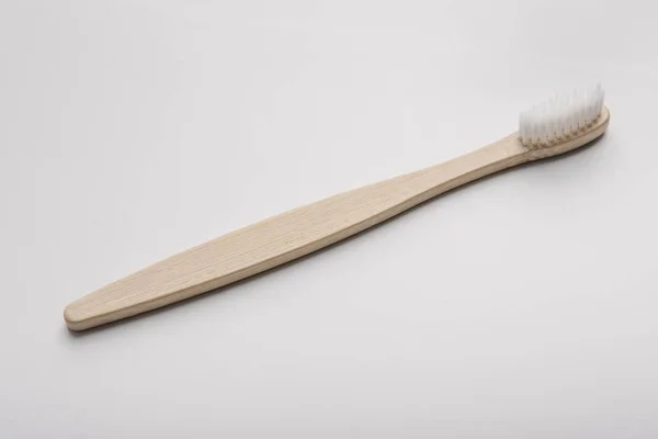 Eco natural bamboo toothbrush on white background — Stock Photo, Image