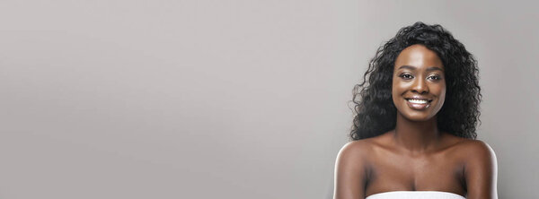 Beauty portrait of attractive afro woman with perfect skin, long banner