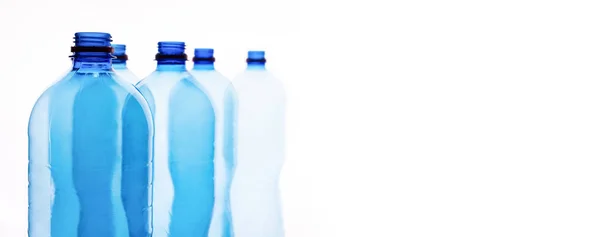 Bottiglie di plastica separate vuote isolate su bianco — Foto Stock