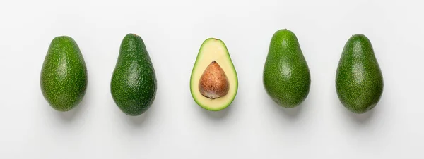 Collage af avocado med frø på hvid baggrund - Stock-foto