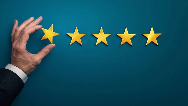 Hand van de klant geeft een one star rating, slechte ervaring — Stockfoto