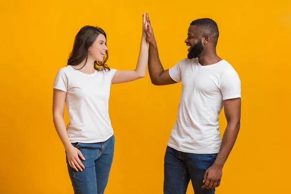 Joyful Interracial Couple Giving High Five To Each Other — 스톡 사진