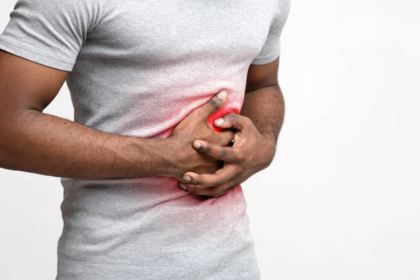 Man with abdominal pain over white background — 스톡 사진