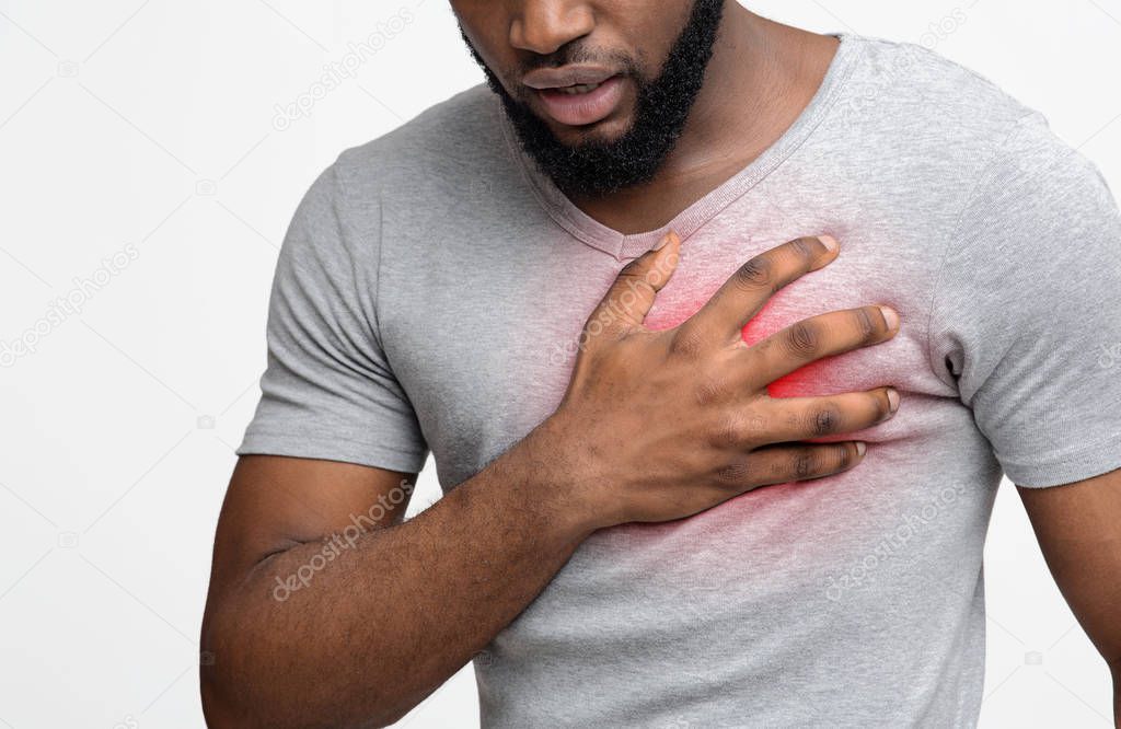 Young man suffering from severe chest pain