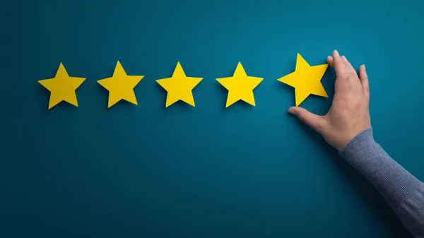 Business woman pointing five star to increase the rating