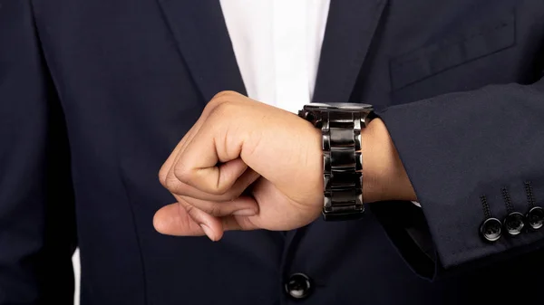 Unrecognizable man checking time on his wristwatch — 图库照片