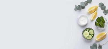 Gri üzerine izole edilmiş eko doğal kozmetik malzemeleri seti.