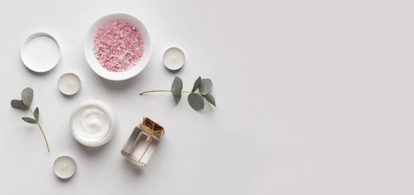 Homemade spa with rose salt, cream and oil on gray background — 스톡 사진