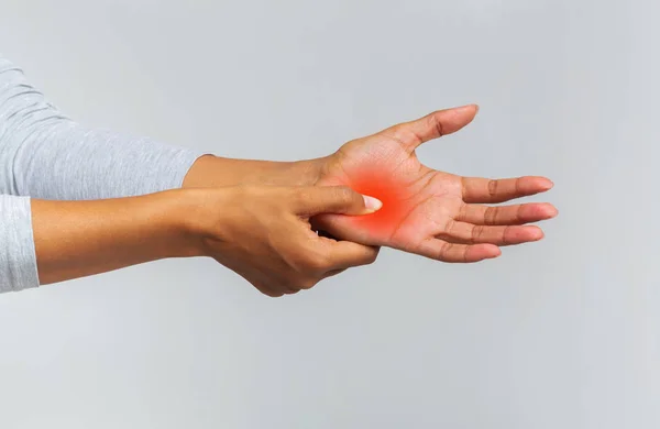 Cropped of woman massaging hand to stop palm ache — 스톡 사진