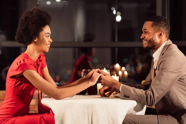 Loving Couple Holding Hands Dating Celebrating Valentines Day In Restaurant — Stok Foto