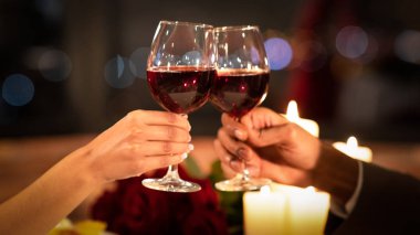 Hands Clinking Glasses During Romantic Date In Restaurant, Panorama