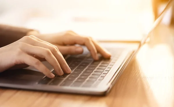 Cropped image of manager typing on laptop computer — 스톡 사진