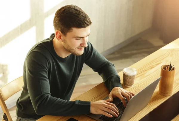 Copywriter Man Working at Laptop Computer In Modern Office, High-Angle — стоковое фото