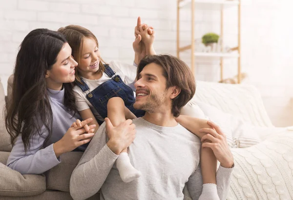 Happy family at home playing together in living room — Stock Photo, Image
