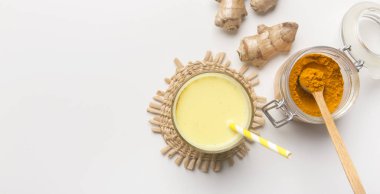 Organic orange turmeric root and powder, mandeln milk