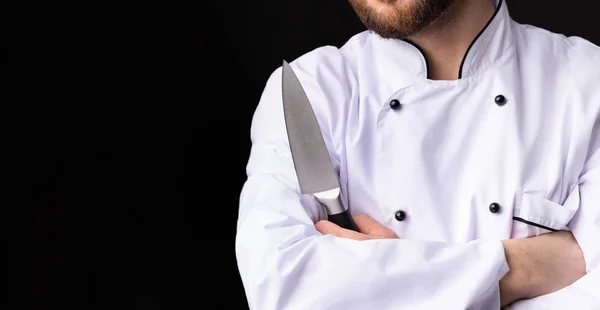 Nóż szefa kuchni stojący na czarnym tle, przycięty, Panorama — Zdjęcie stockowe