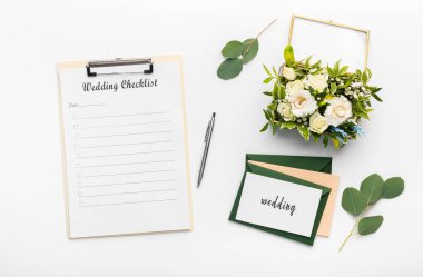 Wedding empty planning checklist, wedding accessories on white