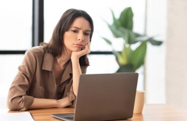 European young manager wants to sleep at work place