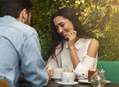 Pretty Girl Laughing Flirting With New Boyfriend In Cafe