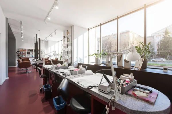 Tables for manicure with professional tools, panoramic windows — ストック写真