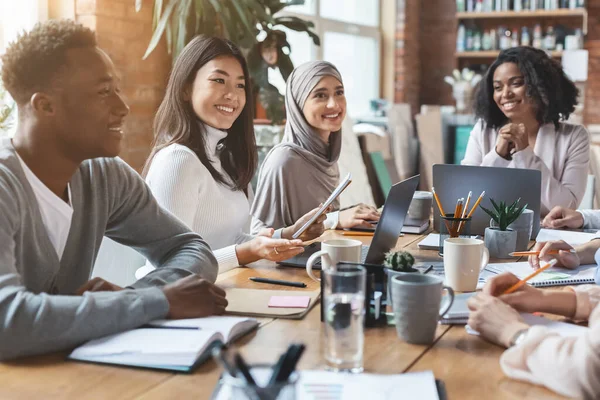 Close up of young multiracial team having meeting in office — Stock Photo, Image