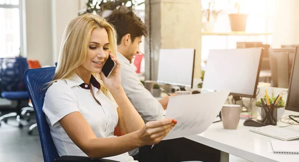 Professional business clerk young woman talking with clients