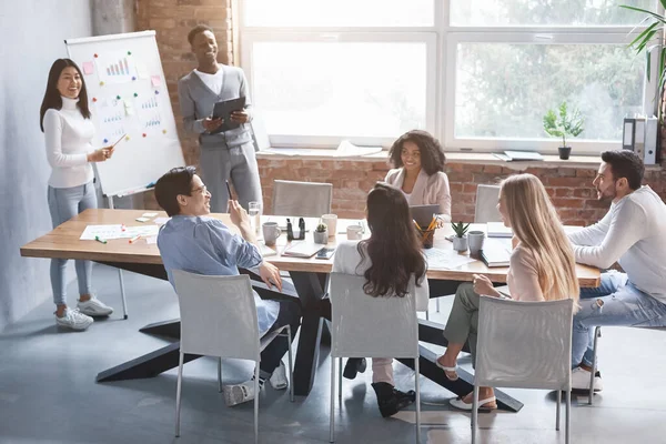 Cheerful international colleagues having business presentation in office — Stock Photo, Image