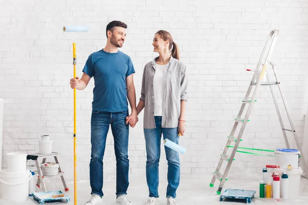 Couple with paint and instruments planning home repair — Φωτογραφία Αρχείου