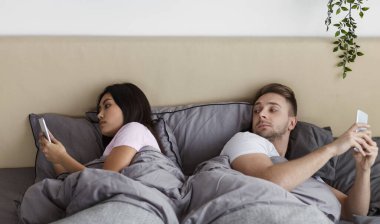 Jealous Husband Peeking At Wifes Phone Texting Lying In Bed