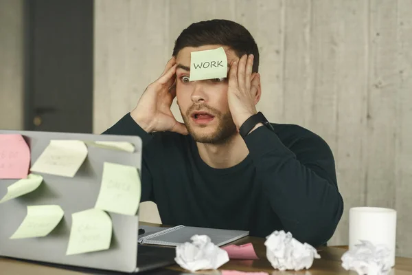 Shocked Manager Having Sticky Notes Everywhere Sitting Indoor — Stock Fotó