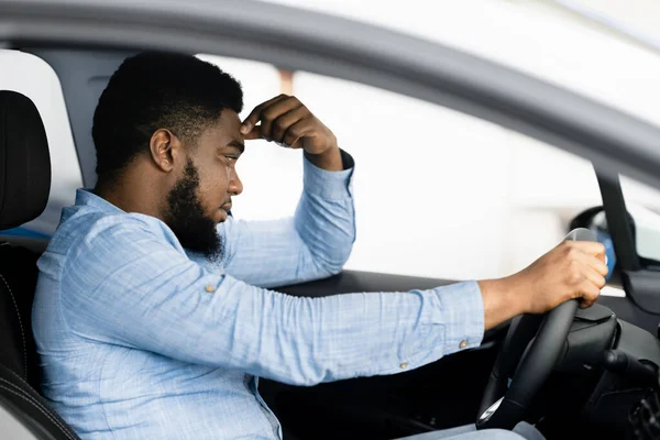 Depressed Man Sitting In Drivers Seat Of Too Expensive Car — Stock Fotó