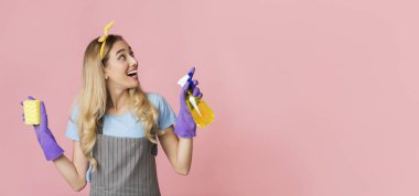 Funny girl spraying and looking at empty place clipart