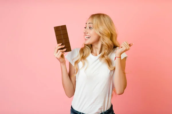 Cheerful woman want to eat milk chocolate — Stok fotoğraf