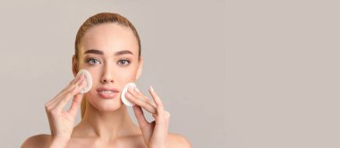 Girl Using Cotton Pads Doing Skincare Routine, Beige Background, Panorama