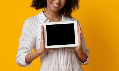 Digital Tablet With Black Screen In Hands Of Unrecognizable Afro Lady