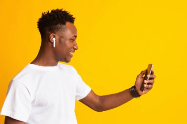 African guy having video call with parents from another country
