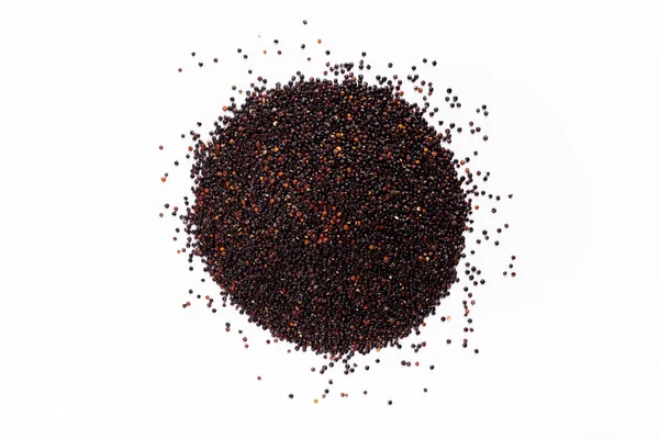 Heap of black quinoa on white background, top view — ストック写真