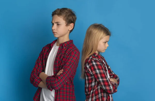 Siblings Misunderstanding. Offended Brother And Sister Ignoring Each Other After Quarrel — Zdjęcie stockowe